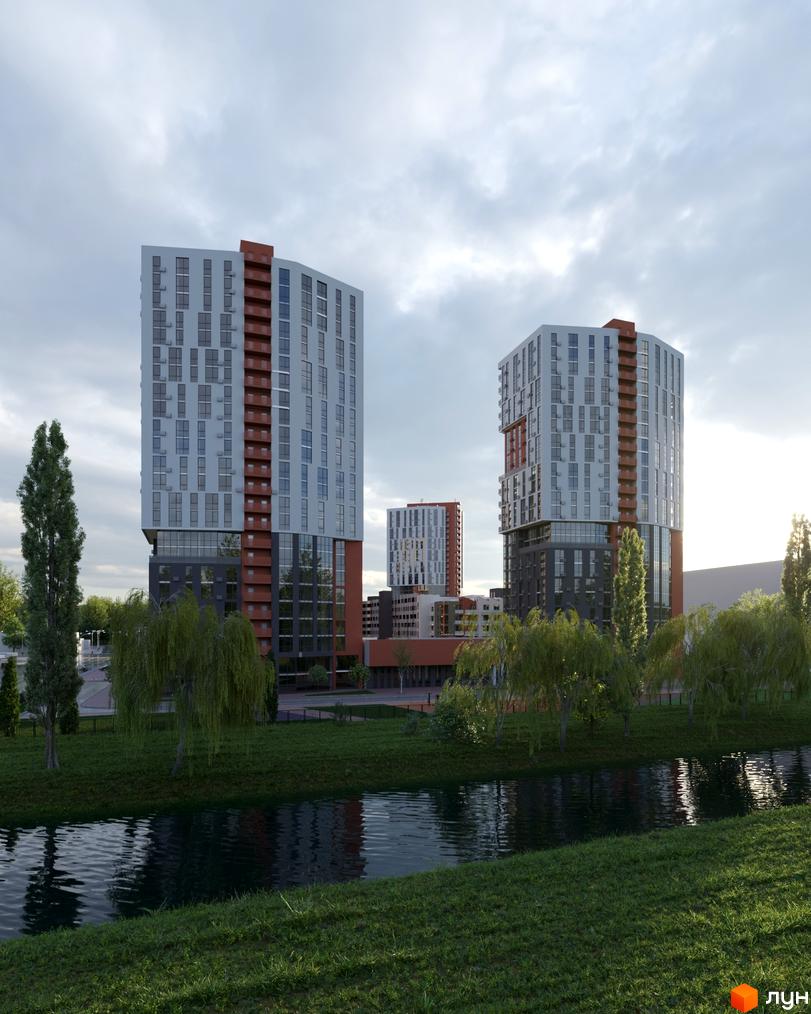 Житловий комплекс BonAparte: висотні будинки з біло-сірими фасадами та цегляними вставками, розташовані біля річки з зеленими насадженнями.