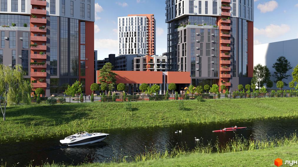 Житловий комплекс BonAparte з фасадами з цегли та скла, розташований біля річки з човнами та людьми на каяках.