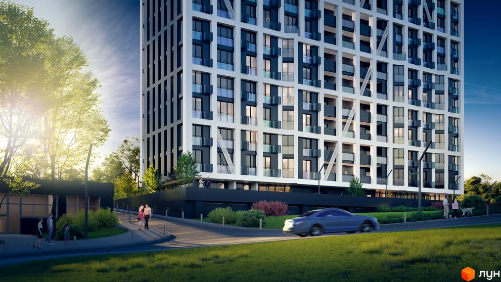 Житловий комплекс Nordica Residence з біло-сірим фасадом та скляними балконами. Перед будинком розташована доглянута прибудинкова територія з деревами та дорогою.