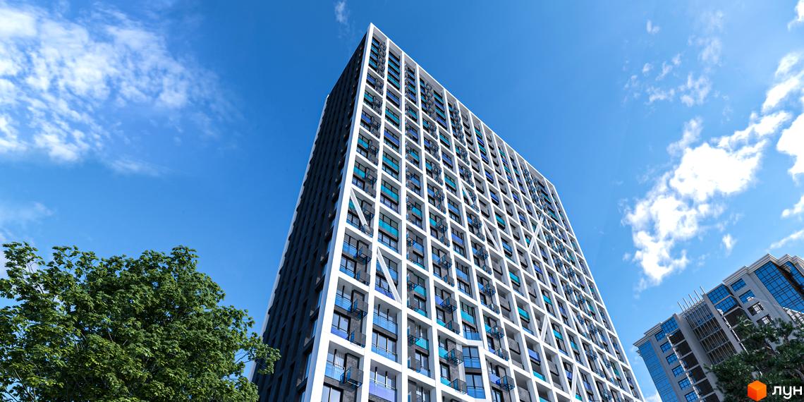 Зовнішній вигляд новобудови ЖК Nordica Residence з білим фасадом та блакитними балконами на тлі блакитного неба. Поруч видно зелені дерева.