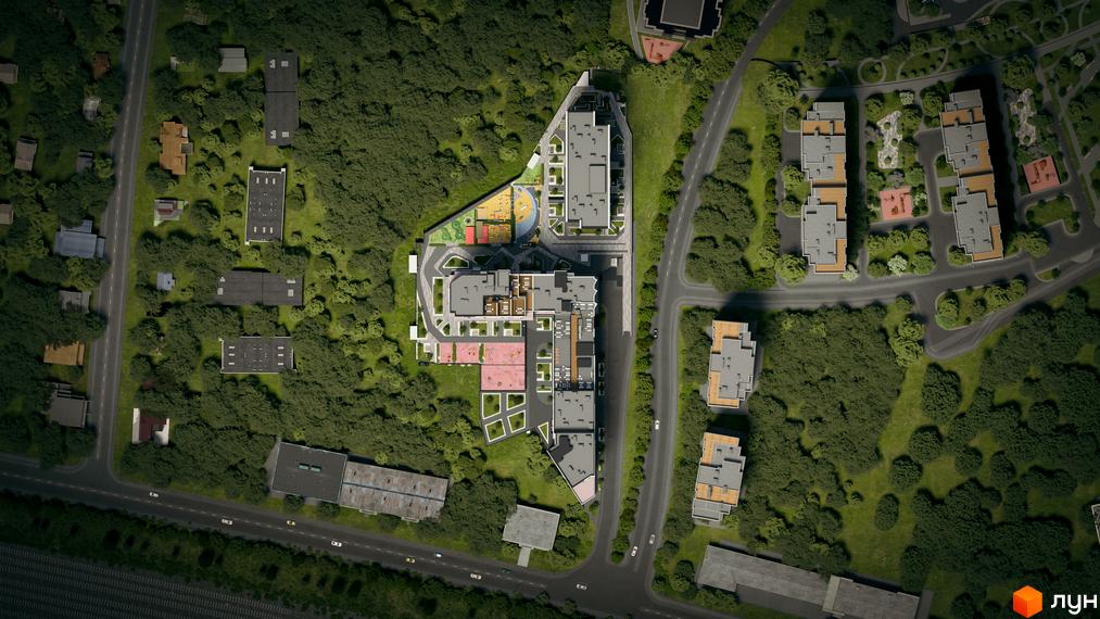Вид зверху на житловий комплекс Nordica Residence з багатоповерховими будинками та прибудинковою територією з зеленими насадженнями та дитячими майданчиками.