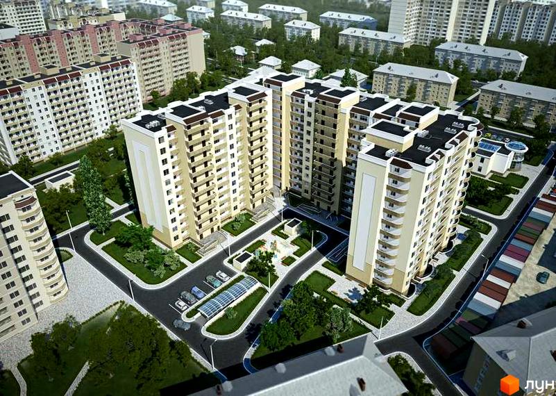 Вигляд зверху на Житловий комплекс Победа: багатоповерхові будинки світлого кольору з балконами, оточені зеленими зонами, дорогами та парковками.