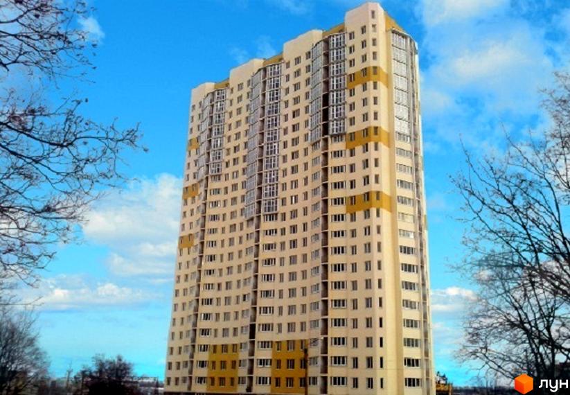 Житловий комплекс Ювілейний з висотним будинком, оточеним зеленими насадженнями та відкритим небом.