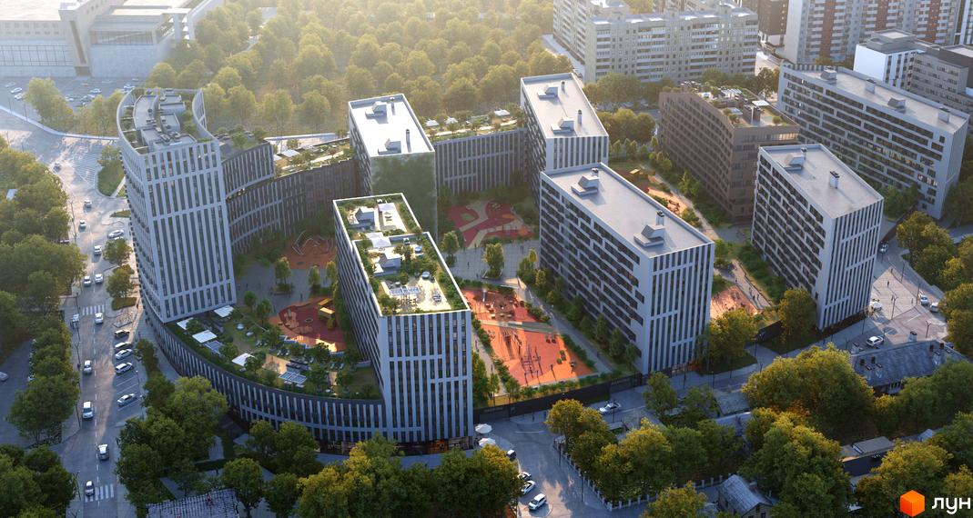 Аерофотографія Житлового комплексу Greenville Park Lviv з висотними будинками та зеленими дахами, оточеними внутрішніми дворами з ігровими майданчиками та деревами.