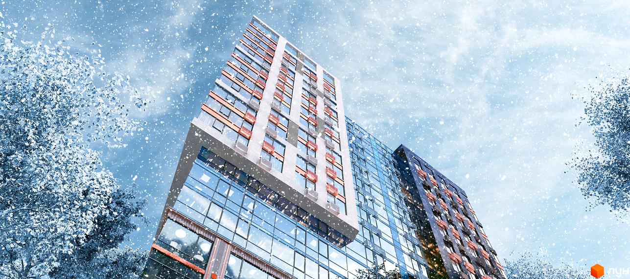 Житловий комплекс АРСЕНАЛ House взимку з падаючим снігом. Сучасна архітектура будівель з панорамними вікнами та цегляним фасадом.
