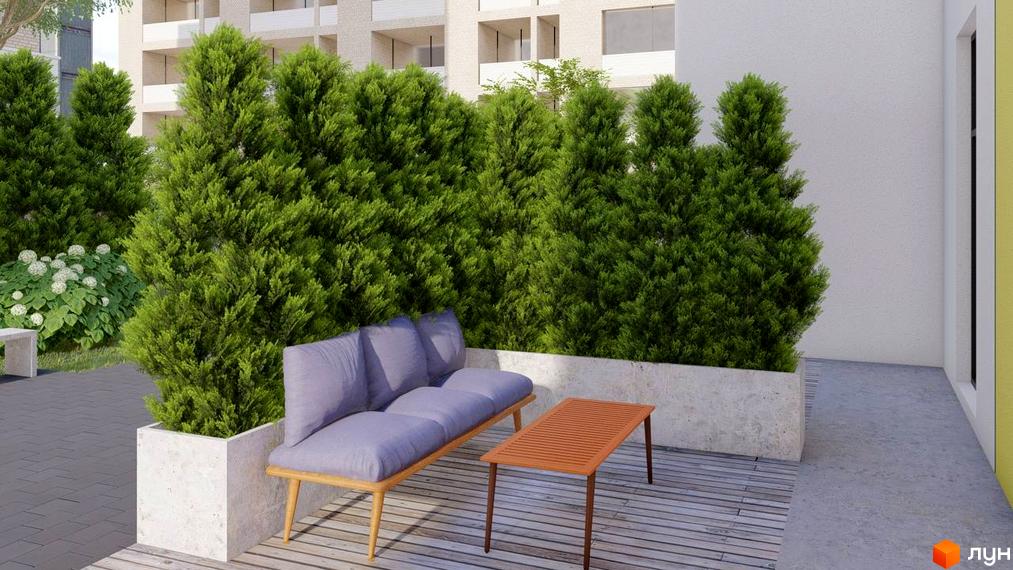 Зображення фасаду будинку житлового комплексу ART HOUSE з зеленими насадженнями та зоною відпочинку з диваном та столиком.