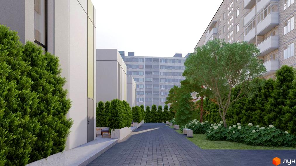 Зображення житлового комплексу ART HOUSE. На фото видно будівлю з білими стінами та доглянуту прибудинкову територію з зеленими насадженнями та бруківкою.