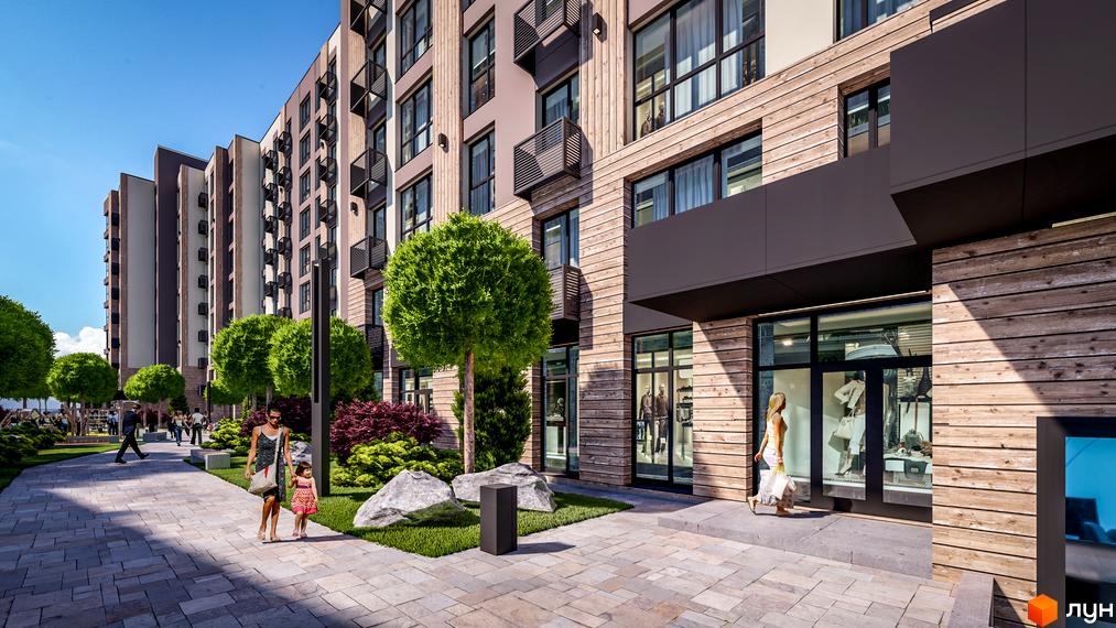 Фасад багатоповерхового будинку ЖК PARKOVIY з панорамними вікнами та оздобленням з дерева. На прибудинковій території висаджені дерева, кущі та облаштовані доріжки.