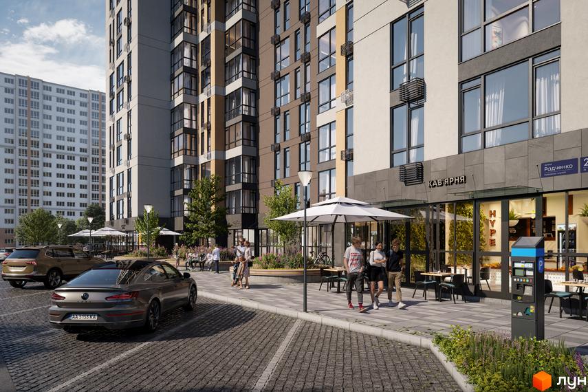 Житловий комплекс ПРОСТІР. Зовнішній вигляд будинку з фасадом з керамограніту та склінням, прибудинкова територія з парковкою та зонами відпочинку.