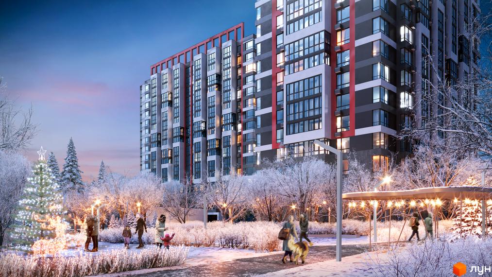 Житловий комплекс 7 KVARTAL взимку з новорічною ялинкою та людьми на території. Сучасна архітектура будівлі та зимовий ландшафт.
