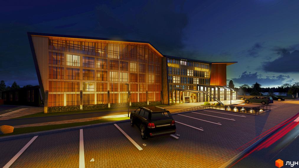 Апарт-готель Rikka KHUST thermal resort вночі з підсвіченим фасадом та парковкою з автомобілями. Сучасна архітектура новобудови.