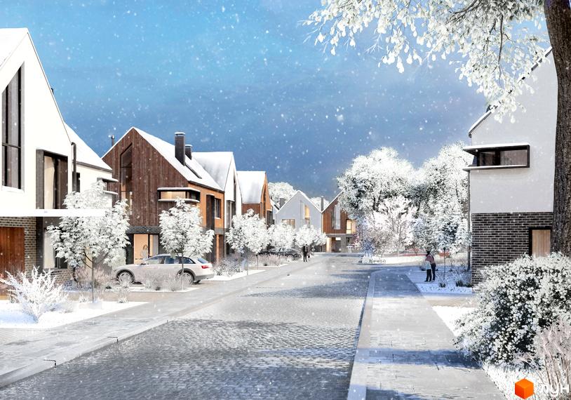 Котеджне містечко КМ Loft City 2.0 взимку з сучасними будинками та засніженими деревами. Новобудова з доглянутою територією та дорогою.