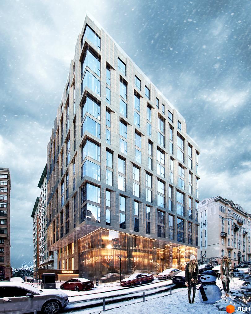 Зображення фасаду ЖК Krauss Gallery взимку. Багатоповерхова будівля з великими вікнами та освітленням, сніг на вулиці, прикраси.