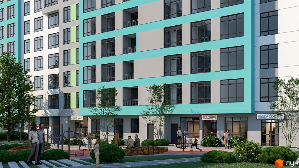 Житловий комплекс Голоські кручі. Зовнішній вигляд новобудови з бірюзовими та сірими фасадами, великими вікнами та прибудинковою територією зі спортивними майданчиками.