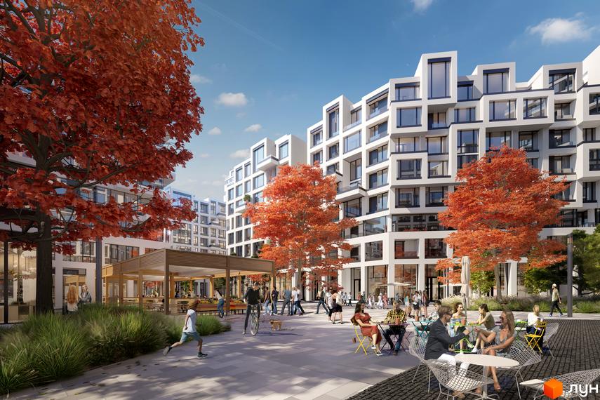 Житловий комплекс UNIT.Home з білими будинками з великими вікнами та облаштованою прибудинковою територією з деревами та місцями для відпочинку.