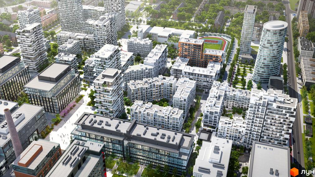 Житловий комплекс UNIT.Home: Аерофотознімок багатоповерхових будівель з білими фасадами, оточених зеленими зонами та пішохідними доріжками.