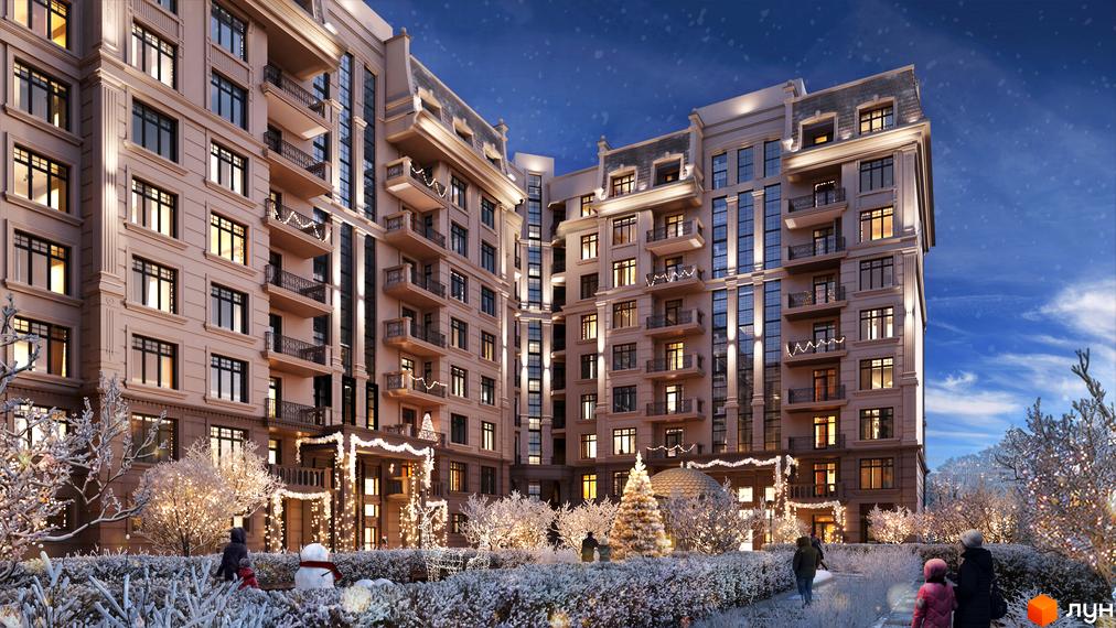 Клубний будинок LA MANCHE у зимовому вечірньому освітленні з різдвяними прикрасами. Зовнішній вигляд будівлі та прибудинкова територія з ялинками та сніговиками.