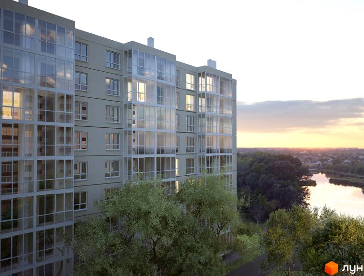 Житловий комплекс Острів 2: багатоповерховий будинок зі скляними балконами та світлим фасадом. Навколо зелені дерева, річка та краєвид на місто.
