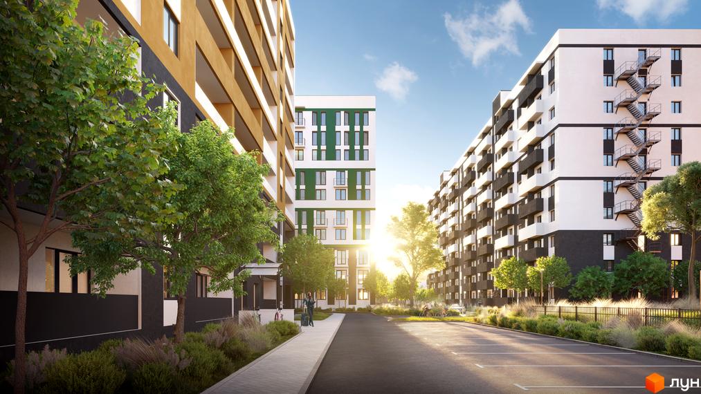 Житловий комплекс Urban City з фасадами білого та чорного кольорів, зеленою вставкою, балконами та зовнішніми сходовими клітками. Навколо будівель розташовані дерева та доглянута прибудинкова територія.