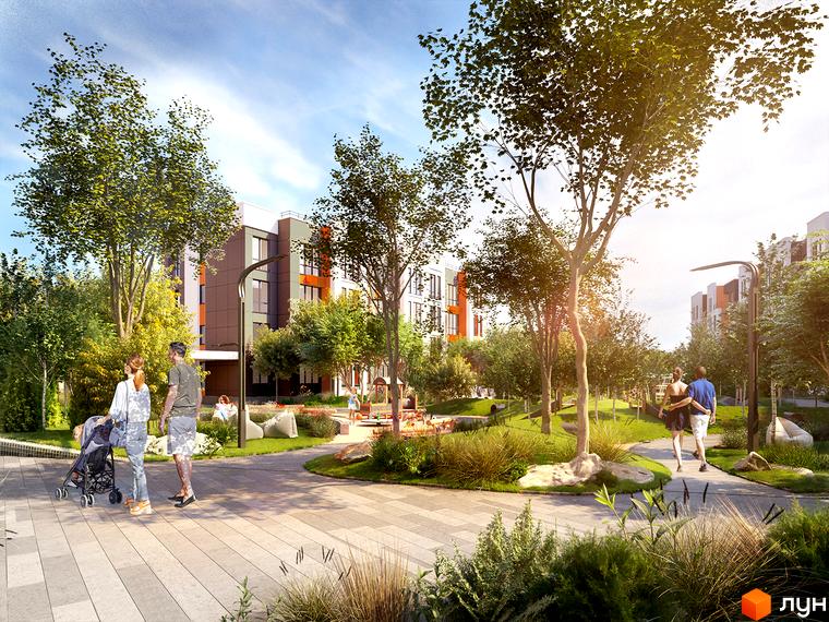 Житловий комплекс Найкращий квартал-2: світлі фасади будинків, доглянута прибудинкова територія з алеями для прогулянок, зелені насадження та дитячий майданчик.