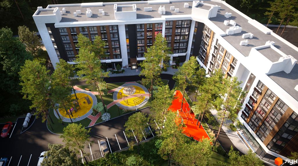 Вигляд зверху на Житловий комплекс Protsev: багатоповерховий будинок з білим та темним фасадом, облаштований двір з ігровими майданчиками та деревами.