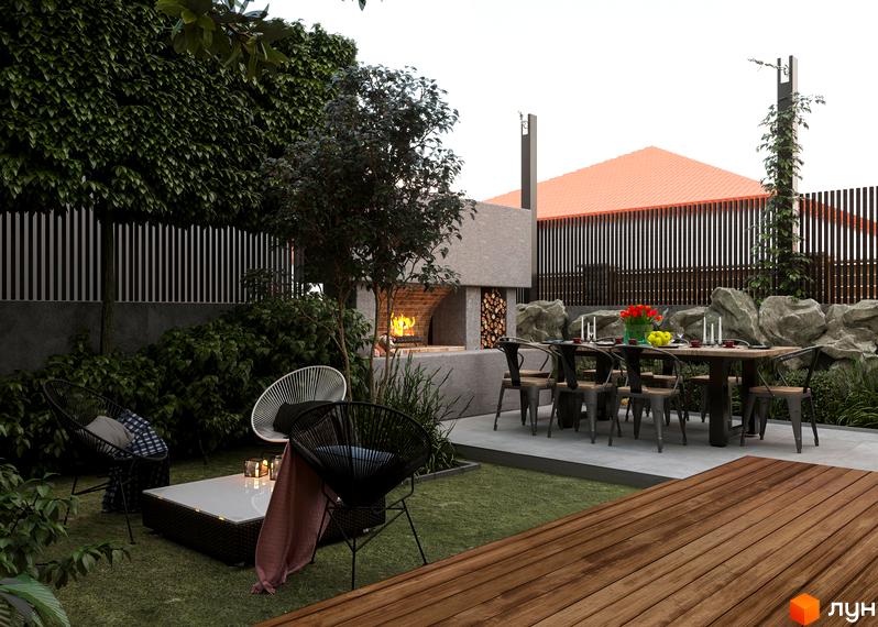 Прибудинкова територія Таунхаусів City Residence з зоною барбекю, обіднім столом та місцями для відпочинку.