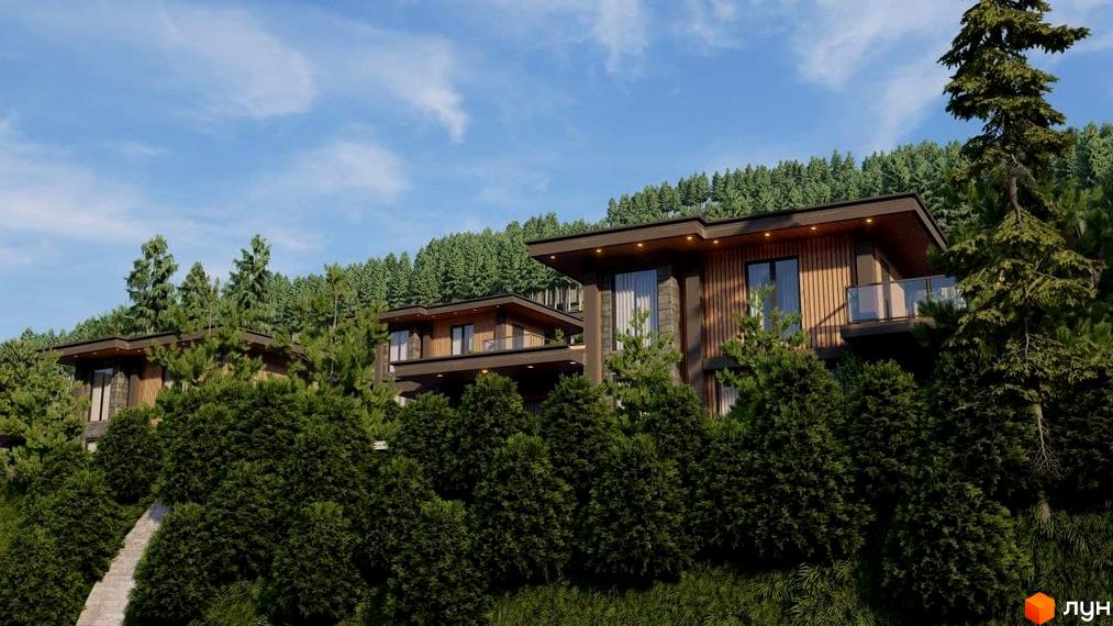 Будинки Котеджного містечка Агат Резорт & SPA з дерев'яним оздобленням та великими вікнами розташовані серед густих зелених дерев на схилі.