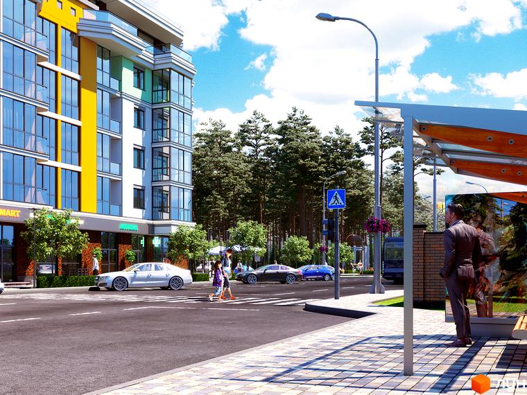 Житловий комплекс Лісова казка 2. Зовнішній вигляд багатоповерхового будинку з яскравими фасадами та великими вікнами. Поруч дорога, автобусна зупинка та зелені насадження.