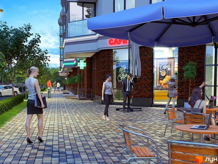 Зовнішній вигляд житлового комплексу Лісова казка 2 з фасадом з цегли та великими вікнами. На прибудинковій території розташовані кафе та зелені насадження.