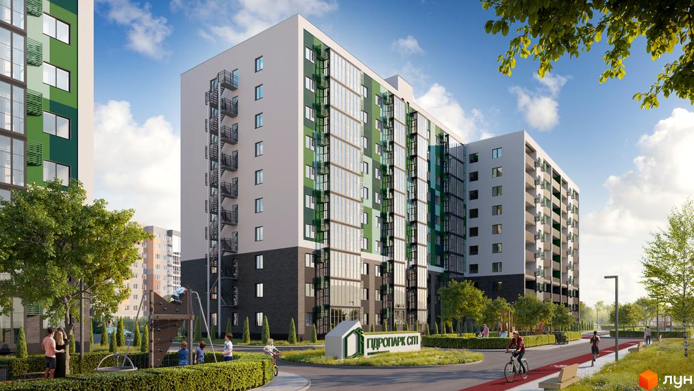 Зовнішній вигляд житлового комплексу Гідропарк Сіті з зеленими фасадами та прибудинковою територією з дитячим майданчиком та зонами для відпочинку.