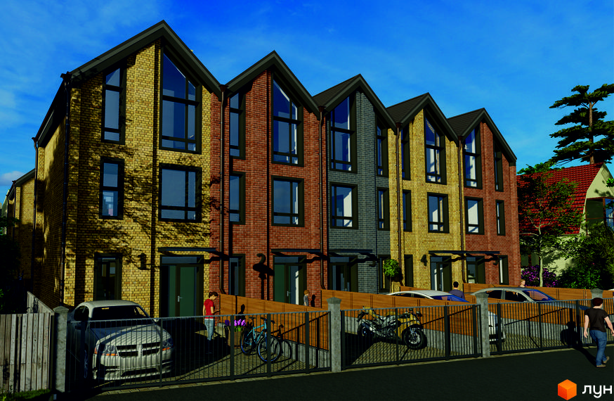 Ряд триповерхових таунхаусів з цегляними фасадами різних кольорів та великими вікнами. Перед будинками огороджена територія з припаркованими автомобілями та велосипедами.