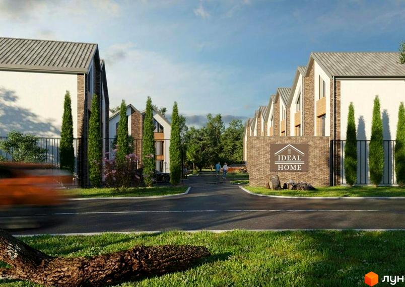 Таунхауси IDEAL HOME з цегляним фасадом та зеленими насадженнями. На території комплексу розташована цегляна брама з логотипом проєкту.