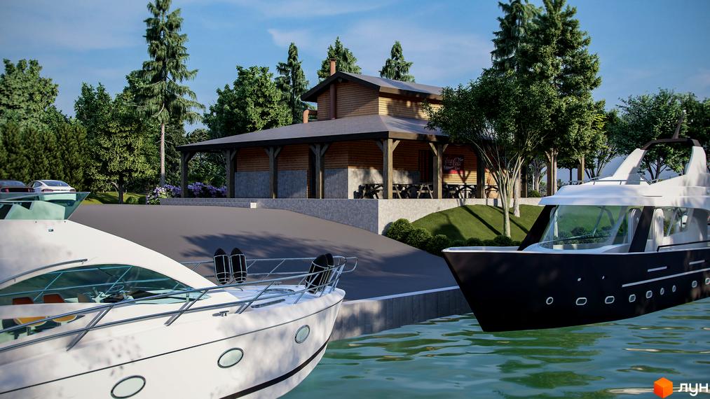 Котеджне містечко Marinero Residence з дерев'яною будівлею та яхтами на воді. Територія навколо комплексу прикрашена деревами та квітами.