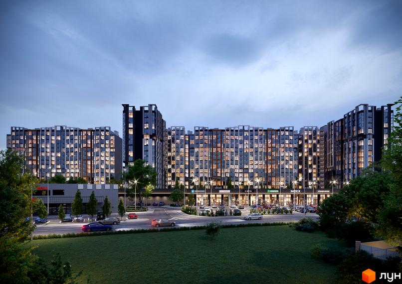 Багатоповерховий житловий комплекс NEXT з великою кількістю вікон, вбудованими комерційними приміщеннями та прибудинковою територією з газоном та дорогою.