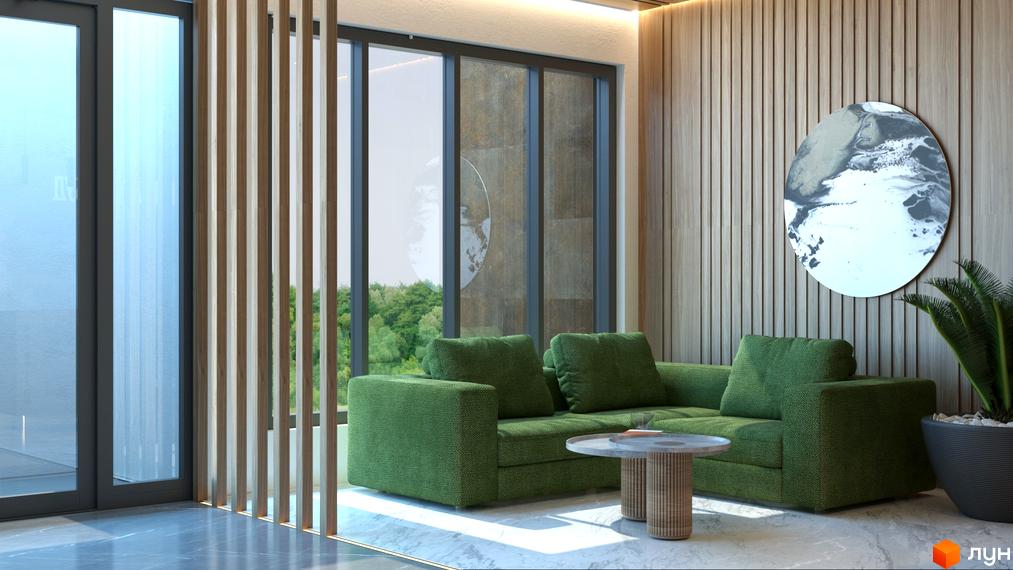 Інтер'єр квартири в ЖК CITY HUB: зелений диван, столик, велике вікно з краєвидом на зелень. Стіна з дерев'яними панелями та кругле дзеркало.