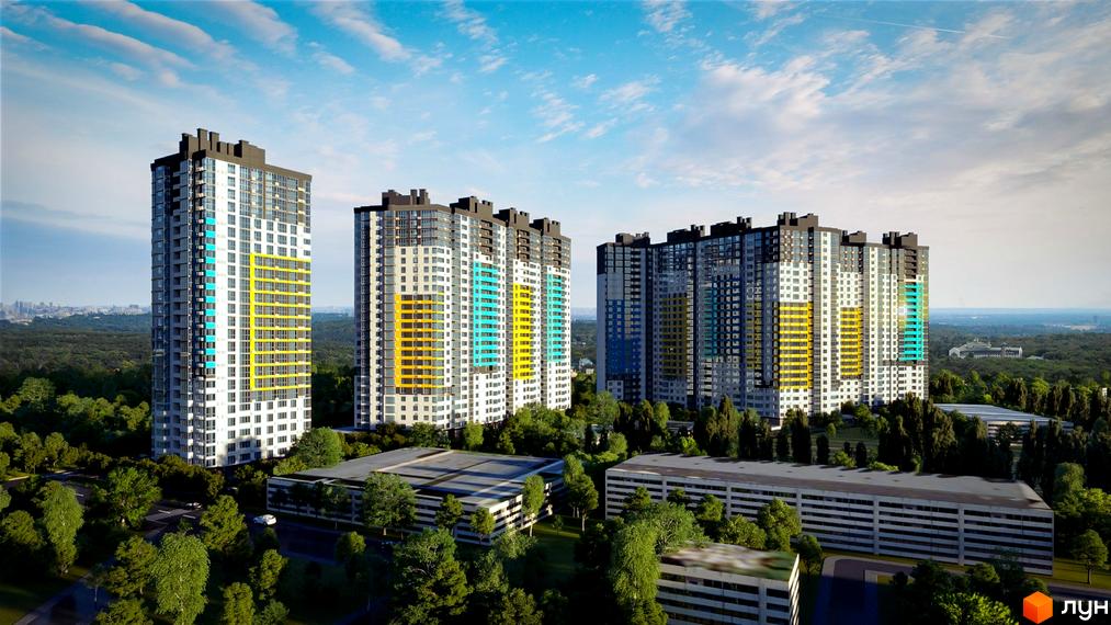 Житловий комплекс Теремки: сучасні висотні будинки з яскравими фасадами та упорядкована прибудинкова територія з зеленими насадженнями.