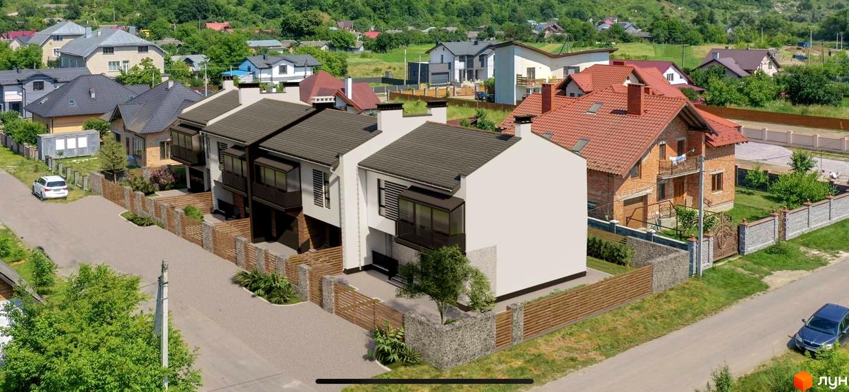 Таунхауси SmartBud з сірими дахами та цегляними фасадами, розташовані на доглянутій прибудинковій території з дерев'яними парканами та зеленню.