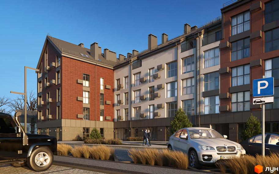 Зовнішній вигляд житлового комплексу Амстердам з цегляним та світлим фасадами, вікнами та кондиціонерами, прибудинкова територія з паркуванням та зеленими насадженнями.