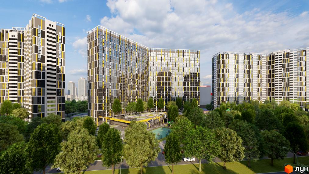 Багатоповерхові житлові будинки з жовто-сірими фасадами на вул. Євгена Маланюка, 101. Прибудинкова територія з зеленими насадженнями та дитячим майданчиком.