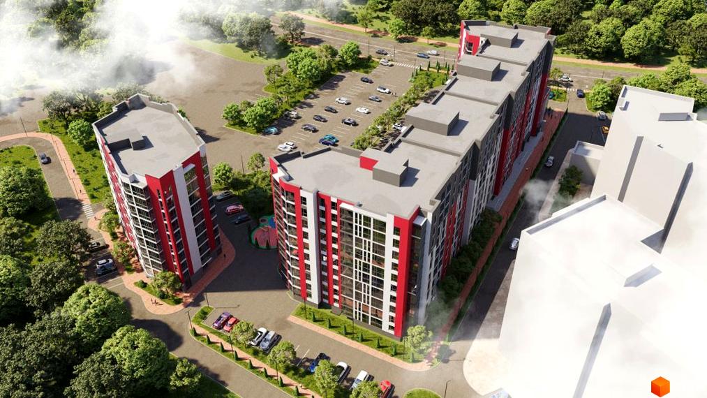 Зовнішній вигляд житлового комплексу GRAND Липини з червоно-білими фасадами та прибудинковою територією з парковкою та деревами.