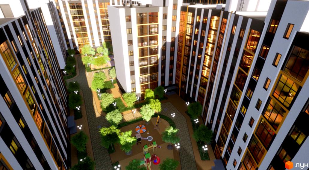 Вигляд на Житловий район Масив Барський з висоти пташиного польоту, видно дитячий майданчик та озеленену територію між будинками.