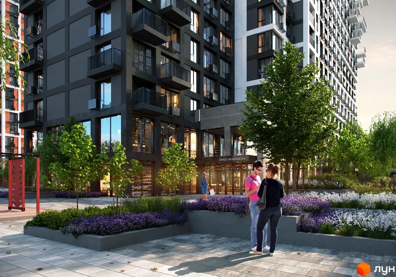 Житловий комплекс Vernadsky з темно-сірим фасадом та балконами. Прибудинкова територія озеленена деревами та квітучими клумбами.