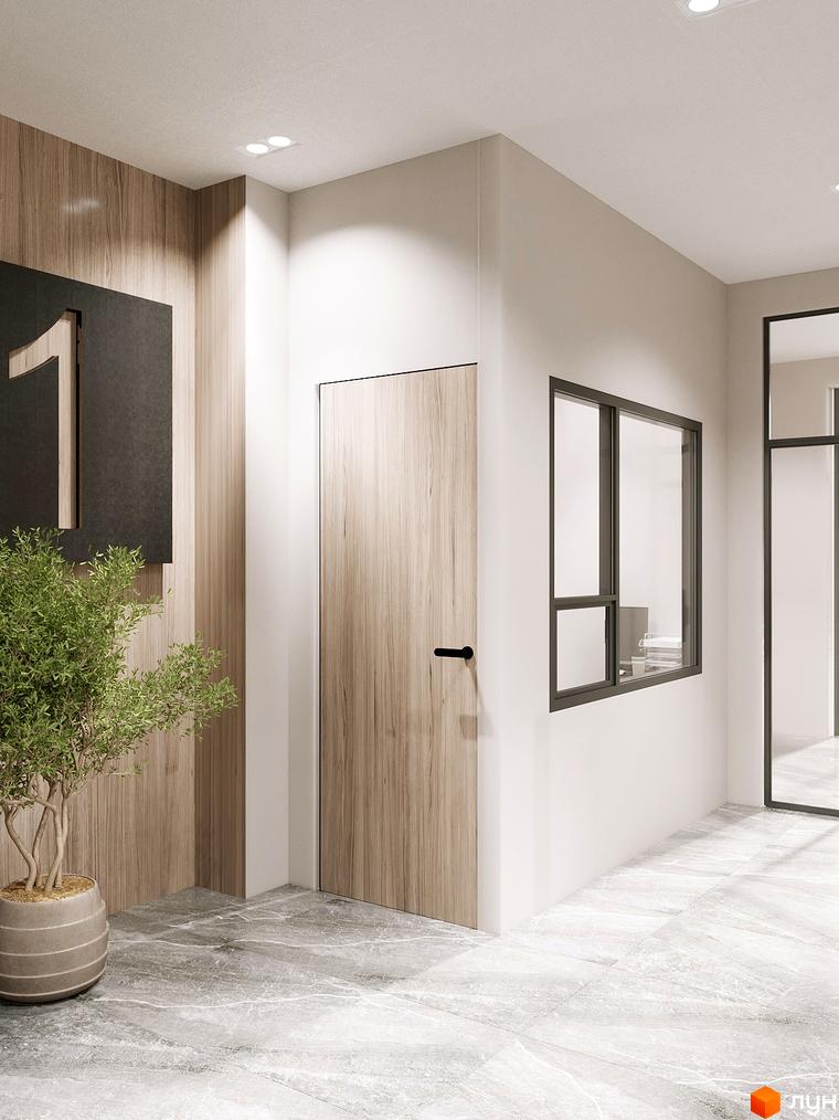 Коридор в новобудові ЖК Globus Elite 2 з дверима, вікном та декоративною рослиною. Світлий інтер'єр з оздобленням з дерева та кам'яною підлогою.