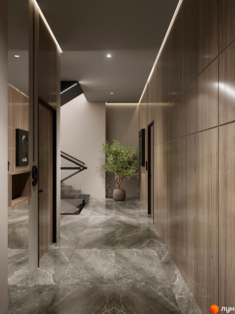Інтер'єр холу в ЖК Globus Elite 2 з дерев'яними панелями на стінах, мармуровою підлогою та рослиною в горщику. Видно сходи та двері.