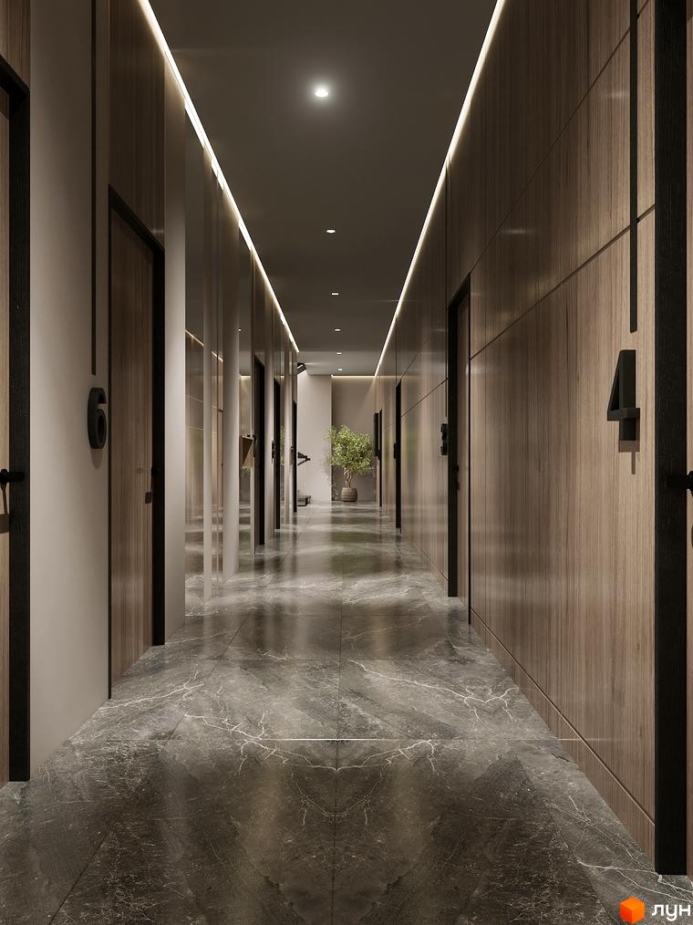 Коридор в новобудові ЖК Globus Elite 2 з дерев'яними панелями на стінах, мармуровою підлогою та вбудованим освітленням. Видно двері з номерами.