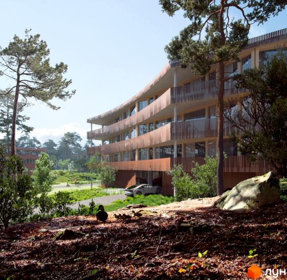 Житловий комплекс O2 City Village. Багатоквартирний будинок з дерев'яним фасадом, балконами та панорамними вікнами, розташований серед лісу, з парковкою та благоустроєм.