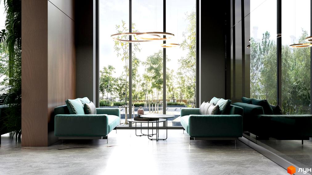 Інтер'єр вітальні в ЖК Greenville Park з двома бірюзовими диванами та журнальним столиком на тлі великих вікон з видом на зелену зону. Сучасний дизайн простору.