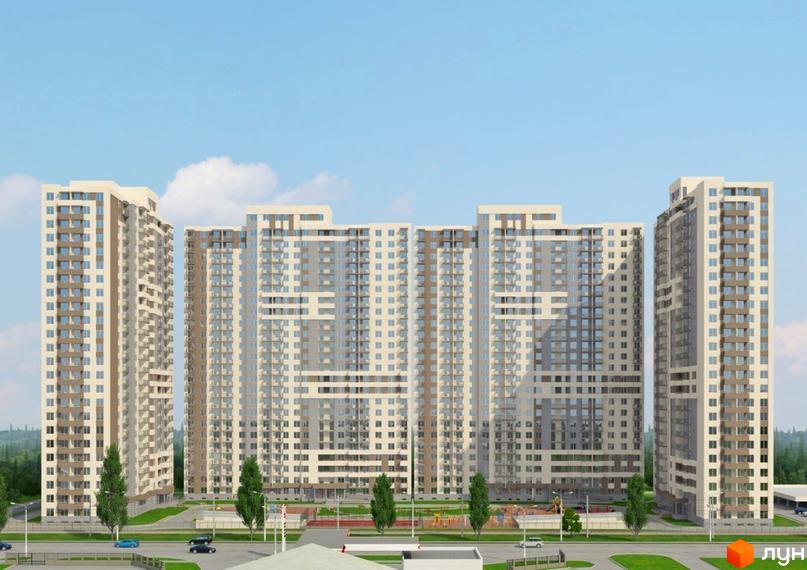 Зовнішній вигляд житлового комплексу Альтаїр 2: багатоповерхові будинки з балконами та великими вікнами. Прибудинкова територія з деревами та дитячим майданчиком.