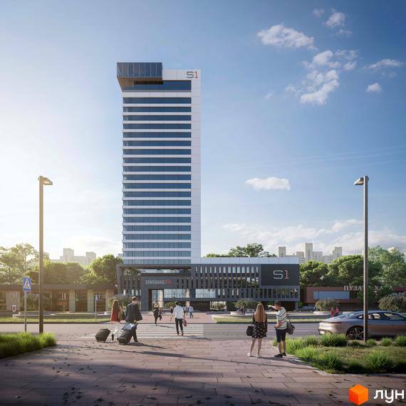 Апарт-комплекс Standard One Terminal – висотна будівля з білою фасадною системою та панорамним склінням. Навколо комплексу – зелена зона та пішохідна вулиця з людьми.