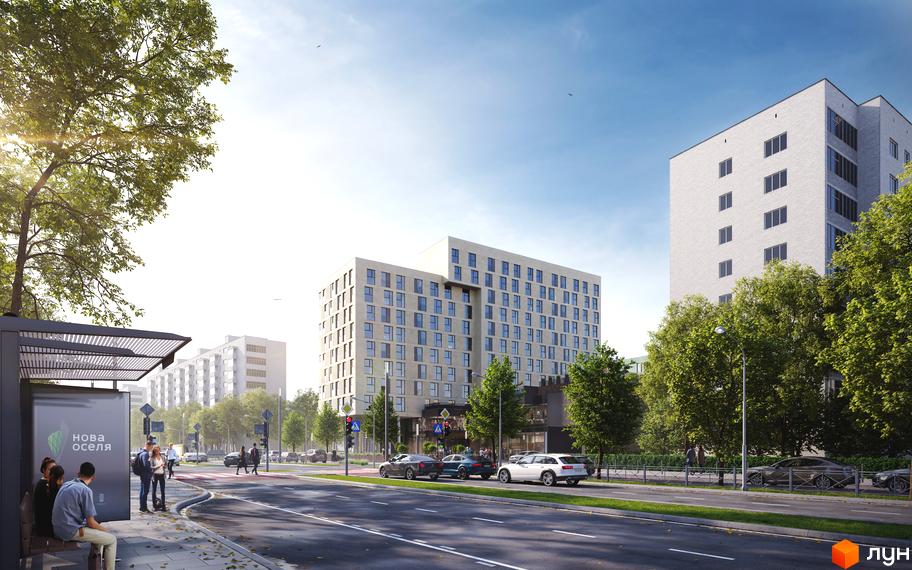 Житловий комплекс Cinematic – це сучасна новобудова з великою кількістю вікон та балконів, розташована біля дороги з автомобілями та пішоходами.